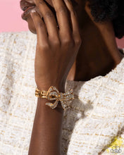 Load image into Gallery viewer, Paparazzi Its All A-BOW-t Me - Gold Bracelet
