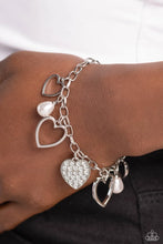 Load image into Gallery viewer, Paparazzi GLOW Your Heart - White Bracelet
